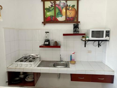 Virtuvė arba virtuvėlė apgyvendinimo įstaigoje Estudios Rehilete