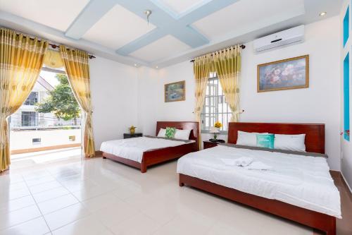 Ліжко або ліжка в номері Amy Villa 4 - Gần Biển - Bida - Karaoke - Phòng Xông Hơi