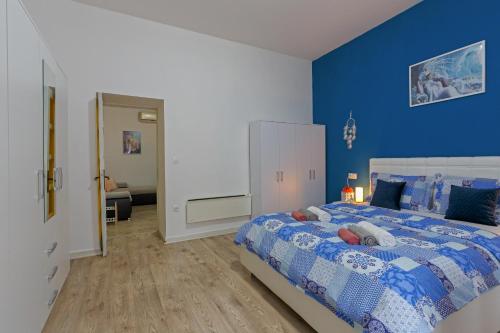 Ένα ή περισσότερα κρεβάτια σε δωμάτιο στο Rich apartment