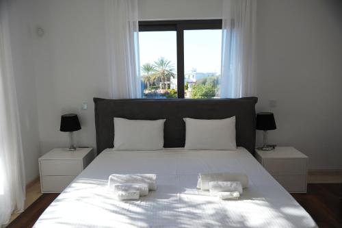 A bed or beds in a room at Luxury 6 bedroom villa with privet pool in Paphos