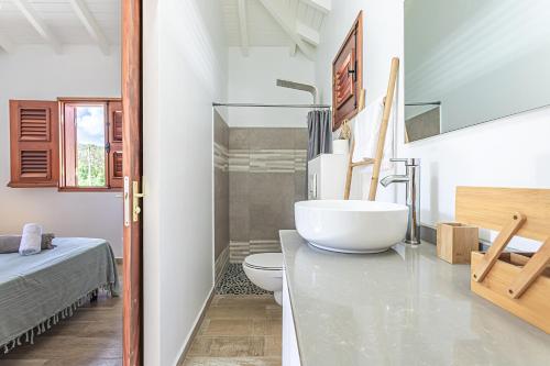 Et badeværelse på Bungalow Damien