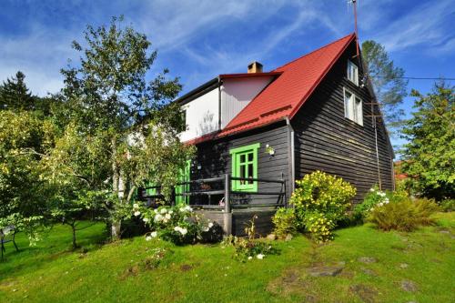 Holiday home in the forest, private garden, sauna