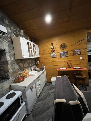 Kuchyň nebo kuchyňský kout v ubytování Apartman Sofranac