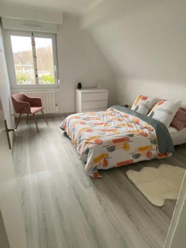 Au paradis d’Alsace 55 m2 nature & relax tesisinde bir odada yatak veya yataklar