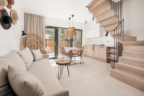 a living room with a couch and a table at AMORZELAS in Dębki