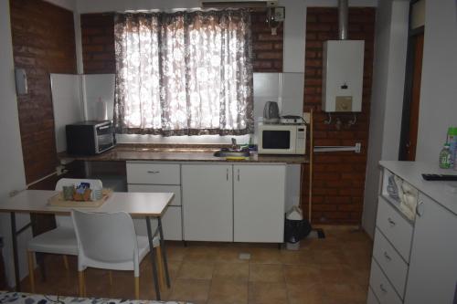 Kuchyňa alebo kuchynka v ubytovaní Kupal Departamentos