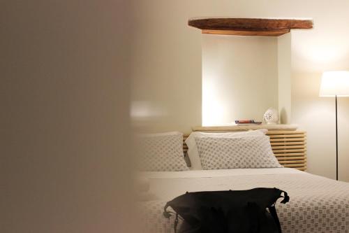 Ein Bett oder Betten in einem Zimmer der Unterkunft Albertario