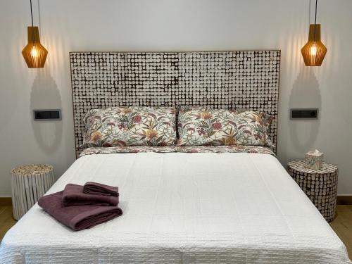Postel nebo postele na pokoji v ubytování apartamento chousa bajo