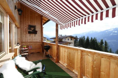 a balcony with a view of a mountain at House in Zell am Ziller with Panoramic Views in Zell am Ziller