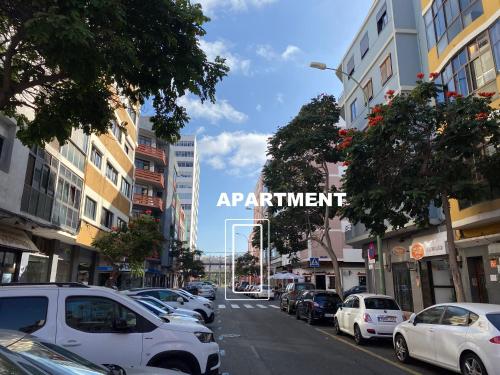 a city street with cars parked on the street at Turina House - 3 habitaciones in Las Palmas de Gran Canaria