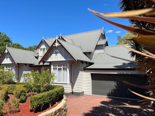 a house with a black roof at Serenity in Healesville