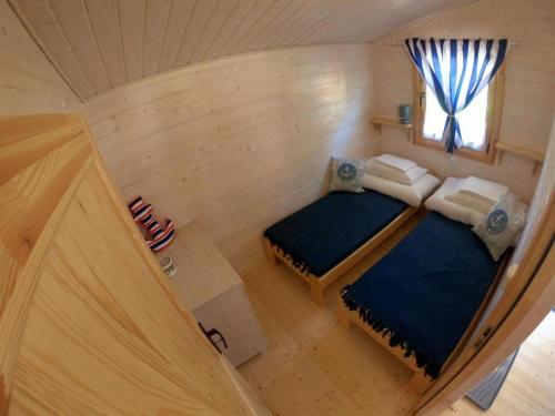 Tempat tidur dalam kamar di holiday home -, -
