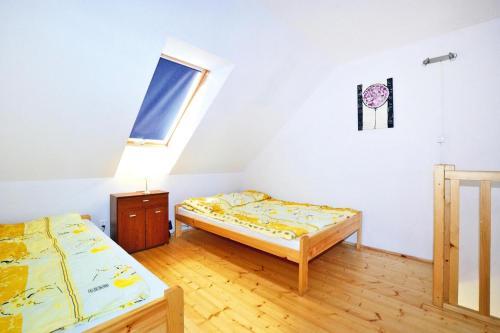 Ένα ή περισσότερα κρεβάτια σε δωμάτιο στο Terraced Houses, Sarbinowo