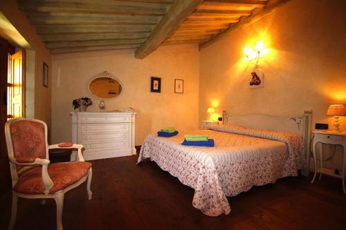 En eller flere senge i et værelse på Villa, Massarosa