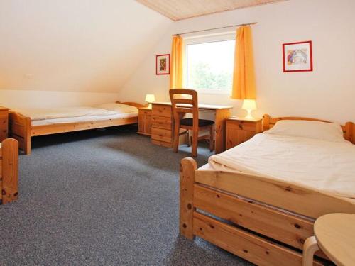 Кровать или кровати в номере Holiday resort in the Müritz National Park, Mirow
