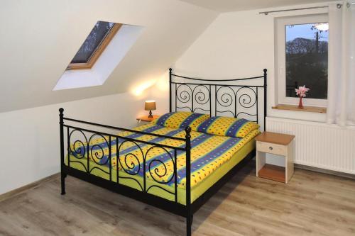 A bed or beds in a room at Holiday flat, Kolczewo