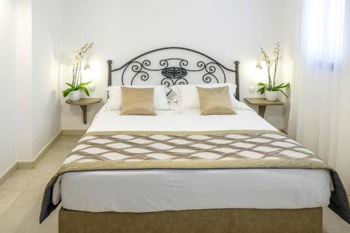 A bed or beds in a room at Apartment in Elia Beach for 2 Person