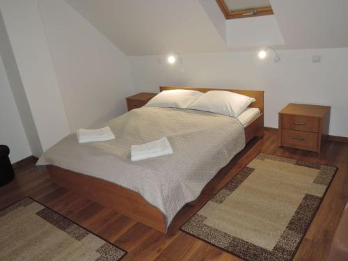 Posteľ alebo postele v izbe v ubytovaní Cottage for four Person near Lake in Kolczewo