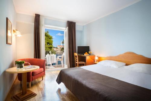 Postel nebo postele na pokoji v ubytování Maistra Select Island Hotel Katarina
