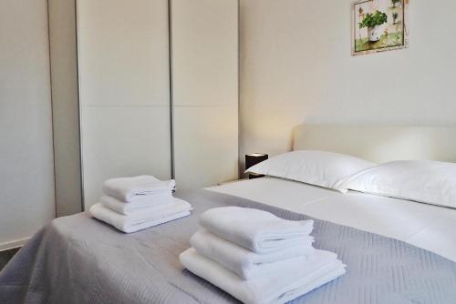 Posteľ alebo postele v izbe v ubytovaní Apartment in Maslenica with Sea View