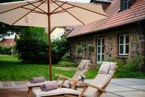 Κήπος έξω από το Relais & Châteaux Gutshaus Stolpe