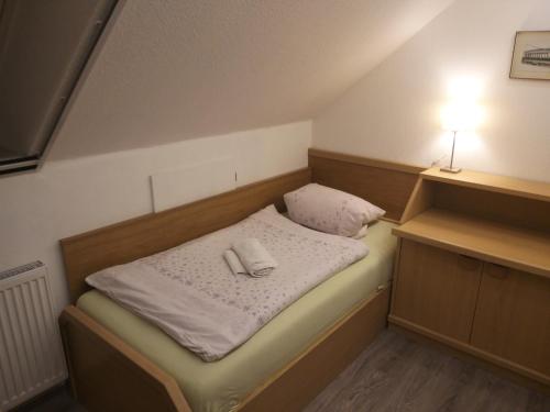 Katil atau katil-katil dalam bilik di WEDEMARK-Apartment-Haus für bis zu 24 Personen