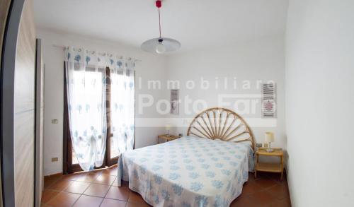 Postel nebo postele na pokoji v ubytování 16B - Casa vacanza sul mare a Porto Mannu