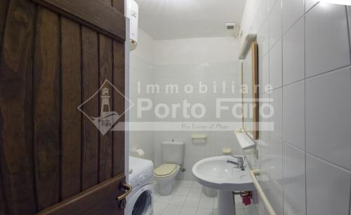 Koupelna v ubytování 16B - Casa vacanza sul mare a Porto Mannu