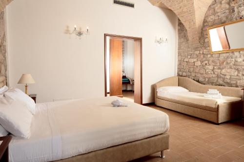 Postel nebo postele na pokoji v ubytování Giotto B&B