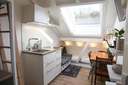 Ett kök eller pentry på gemütliches tiny apartment - nur 10min vom Zentrum