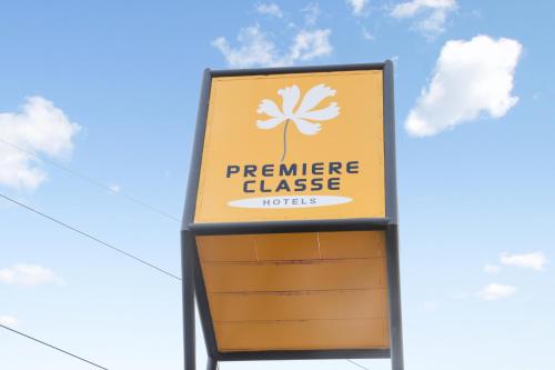 a sign for a peeer cheese hotel at Premiere Classe Thionville - Yutz in Basse-Yutz