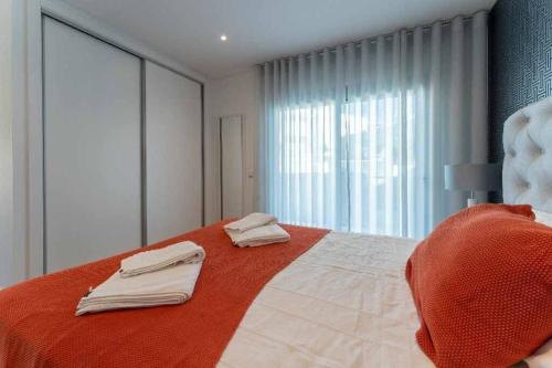 Postel nebo postele na pokoji v ubytování T2 Fonte da Vila