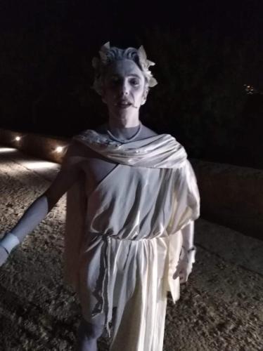 a statue of a woman in a white dress at B&B Le Dune Beach in San Leone