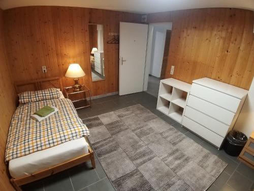 Katil atau katil-katil dalam bilik di WEDEMARK-Apartment-Haus für bis zu 24 Personen