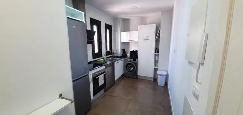 Η κουζίνα ή μικρή κουζίνα στο RICARDO APARTAMENTo