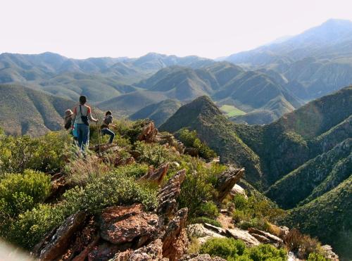 a group of people standing on top of a mountain at The Old School House in Calitzdorp