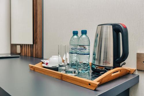 a bottle of water sitting on top of a counter top at Eleven Hotel Baku in Baku