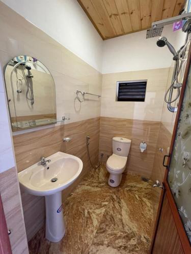 Ванная комната в Saman Beach Guest House