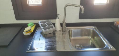 A kitchen or kitchenette at CARLOS APARTAMENTo