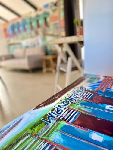 a close up of a colorful painting on a table at Villa Rio by Valada Village in Valada