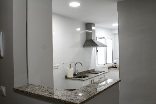 A kitchen or kitchenette at WISH SUITE BASILICA
