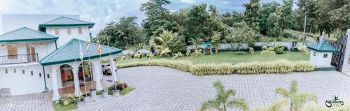 a model of a house with a yard at Lakegala Resort in Matale