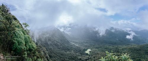 a view of a mountain range with clouds and trees at Lakegala Resort in Matale