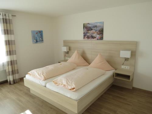 Postel nebo postele na pokoji v ubytování Büchelsteiner Hof