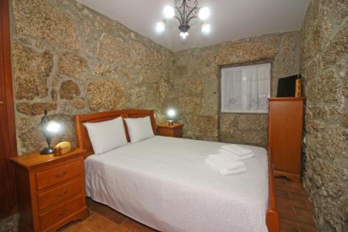 Uma cama ou camas num quarto em Eira Costa House