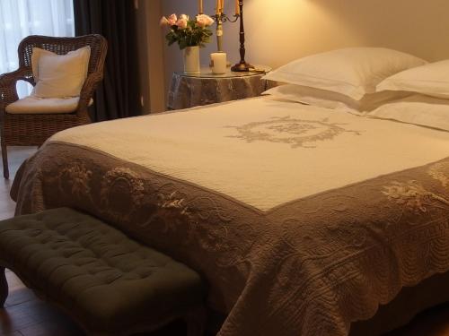 Кровать или кровати в номере Au calme dans la campagne du Haut Anjou