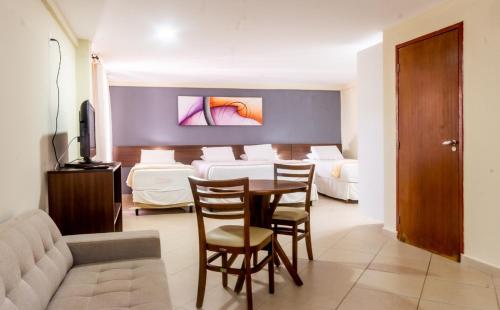 Ruang duduk di Serra Golfe Apart Hotel