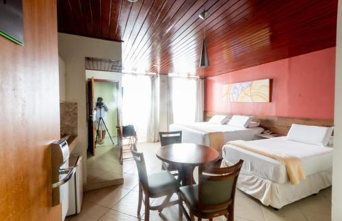 Katil atau katil-katil dalam bilik di Serra Golfe Apart Hotel