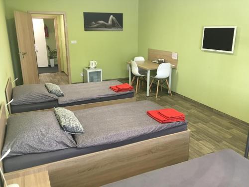 Postel nebo postele na pokoji v ubytování Penzion Relax Litovel