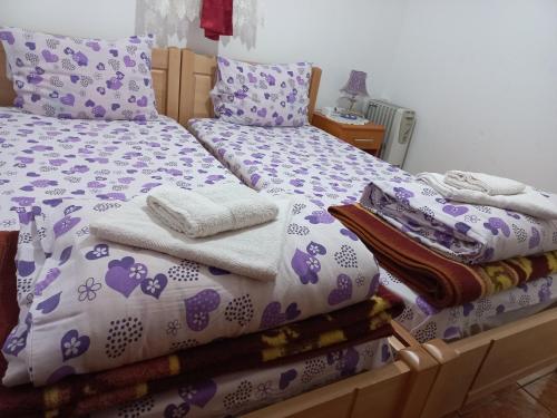 Cama o camas de una habitación en Apartmani Sobe Sljivancanin